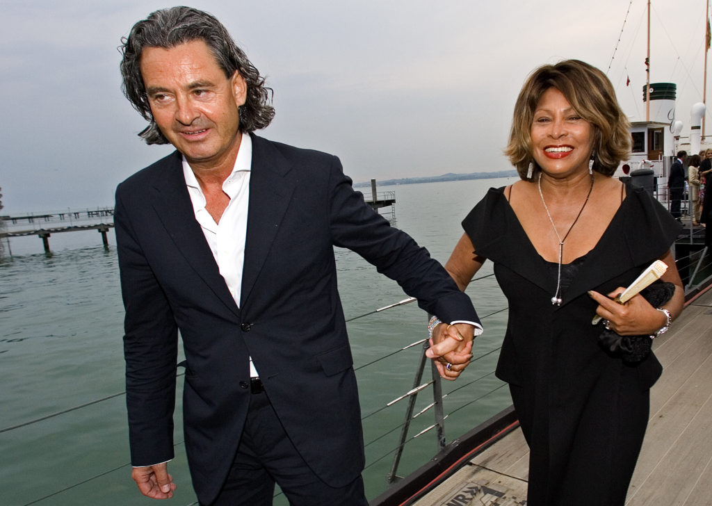 Singer Tina Turner and her long-term German partner Erwin Bach arrive for the premiere of Giacomo Puccini's "Tosca" in Bre...