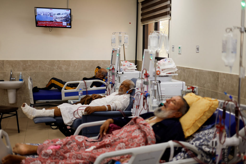 Palestinian kidney patients lie on hospital beds as health officials say they are running out of fuel to operate dialysis ...