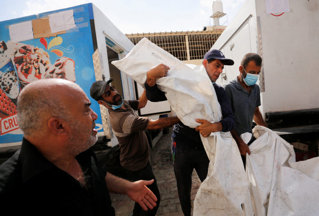 Bodies of Palestinians are kept in ice as hospital morgues are packed amid the ongoing Israeli-Palestinian conflict