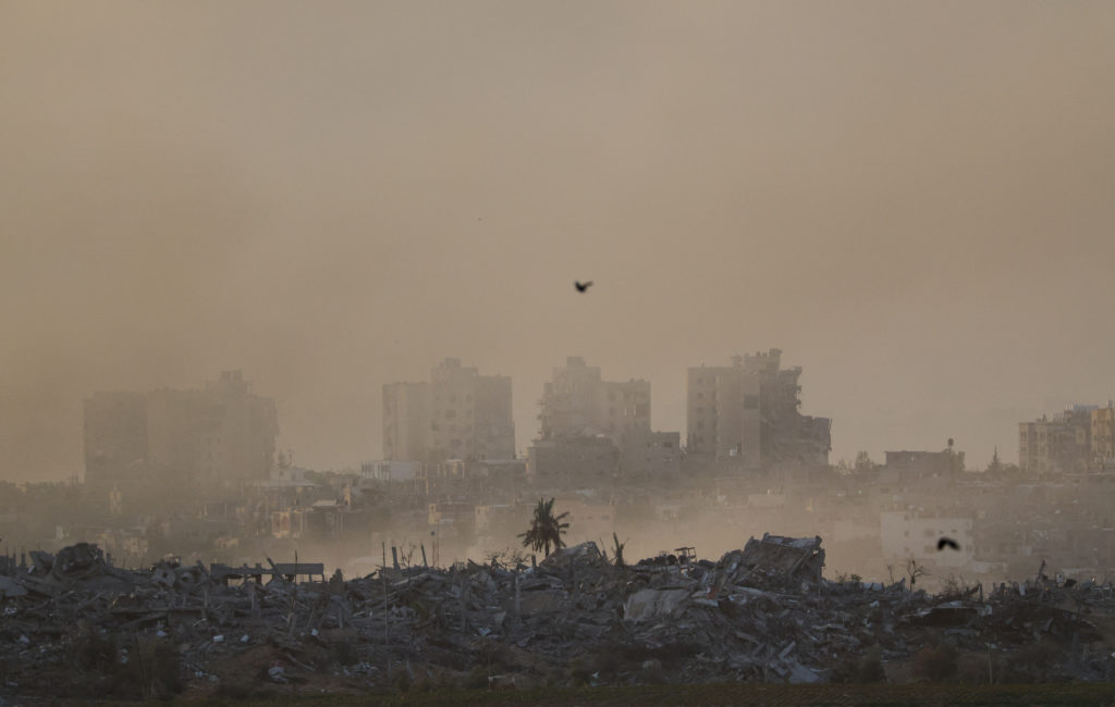 Buildings lie in ruin in Gaza, as seen from southern Israel