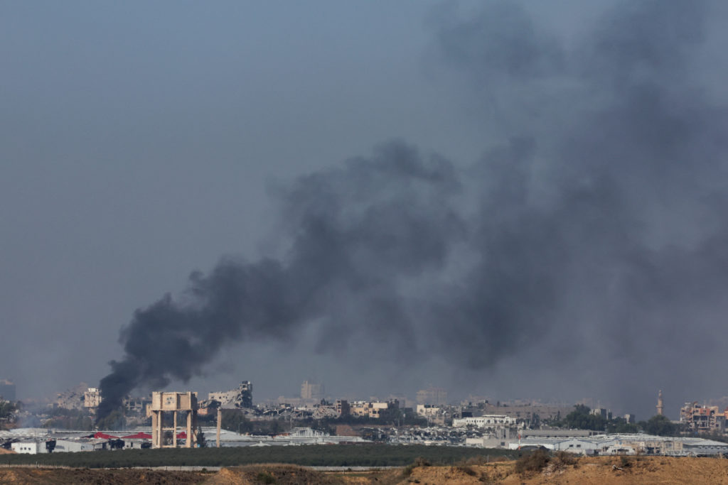 Smoke rises above Gaza as seen from southern Israel