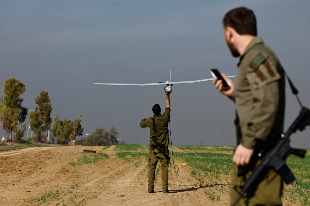 An Israeli military tactical drone operator prepares a drone, amid the ongoing conflict between Israel and the Palestinian...