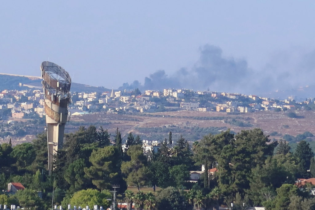Smoke rises above Lebanon, amid cross-border hostilities between Hezbollah and Israeli forces, as seen from northern Israel