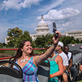 Big Bus Tours Washington DC Lady Taking Selfie on The Bus