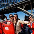 women talking selfie on board Big Bus Tours Sydney