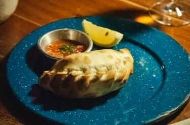 Empanadas served at Florería Atlántico