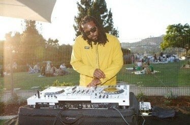 A DJ playing a set on the lawn of the Frank Lloyd Wright-designed Hollyhock House