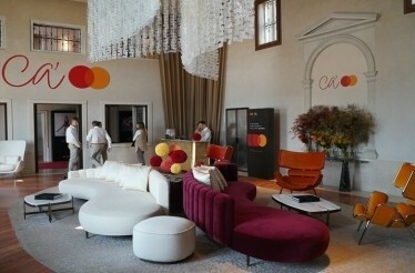 The interior of Palazzo della Misericordia decorated with  Mastercard logos