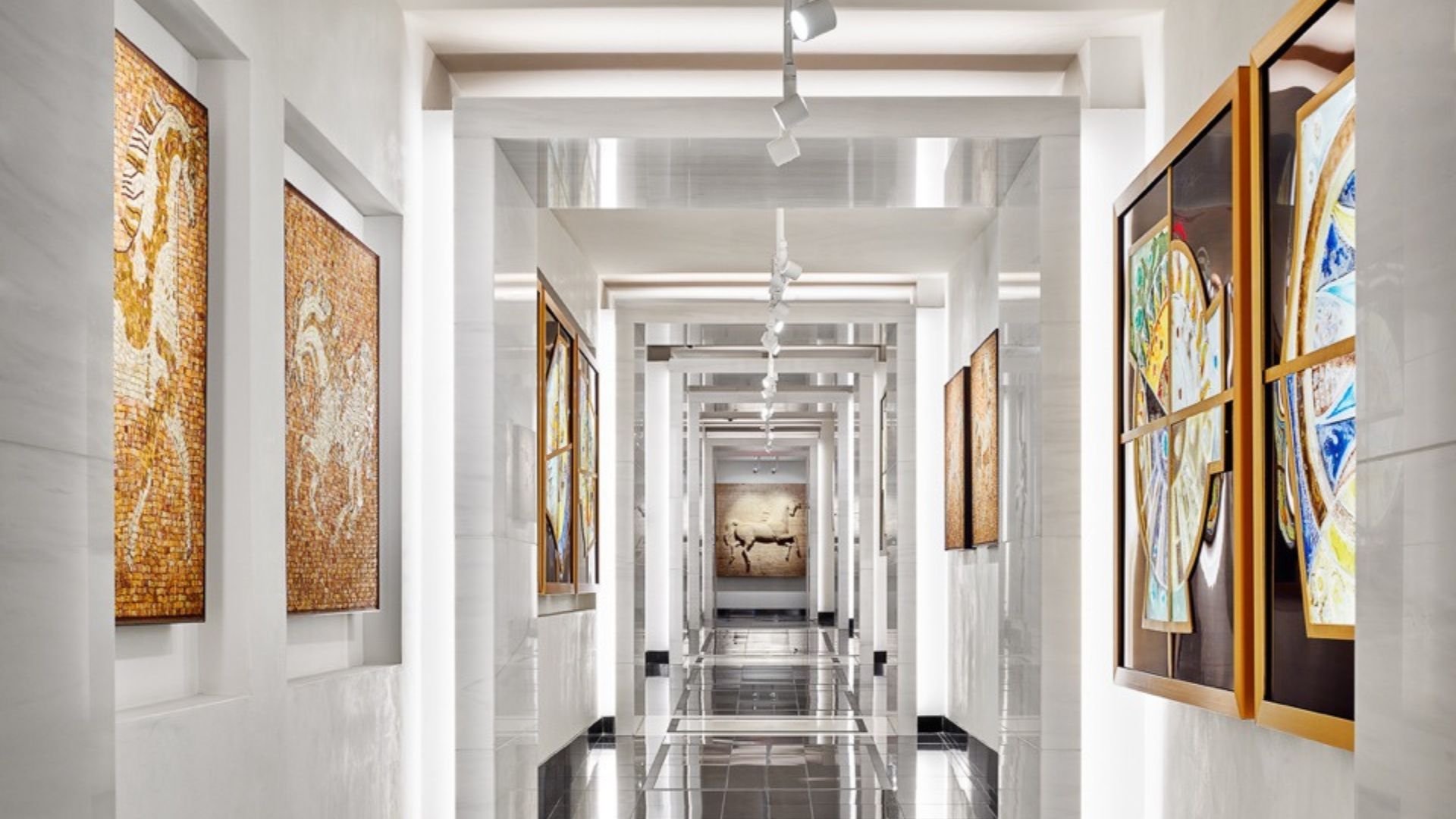 A Hallway With Art On The Walls