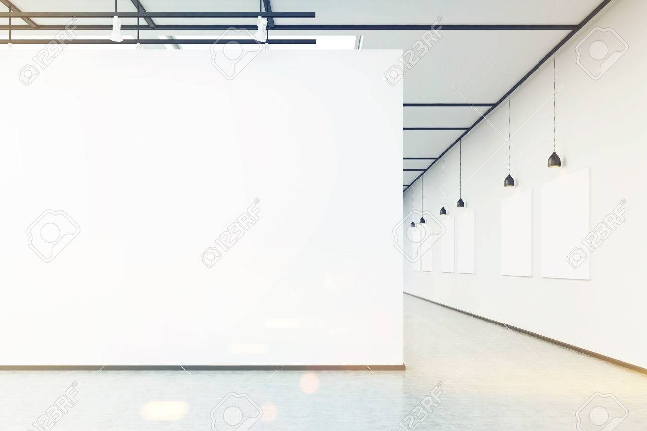 Art Gallery With Large White Wall And Several Empty Banners Within Latest Large White Wall Art (Gallery 12 of 20)