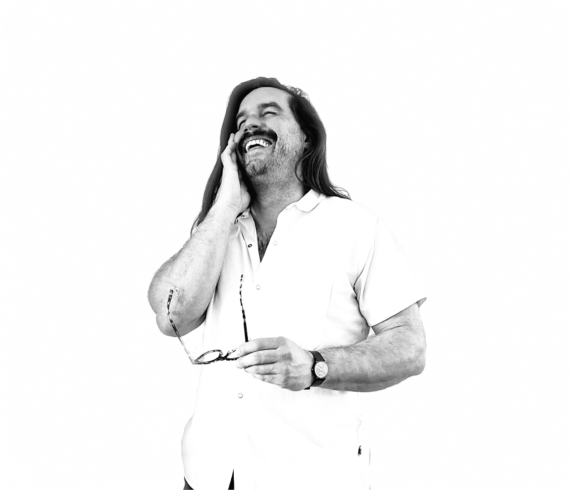 Photo of Derek S. Moore laughing