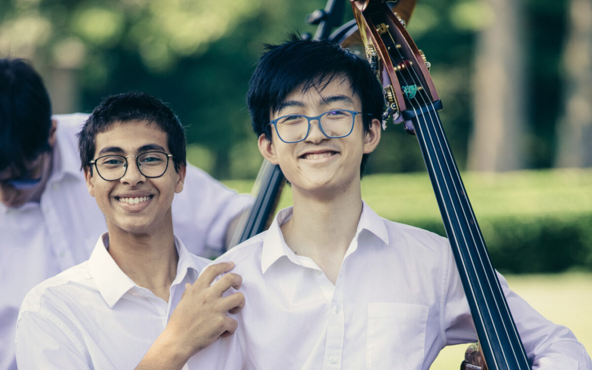 BUTI Students stand outside with their instruments