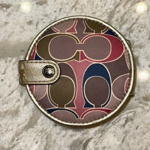 Coach cosmetic mirror.