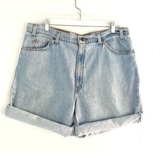 Vintage 80’s Levi’s 550 orange tab light wash denim jean shorts