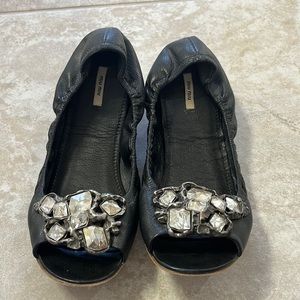 Miu Miu Jeweled flats .