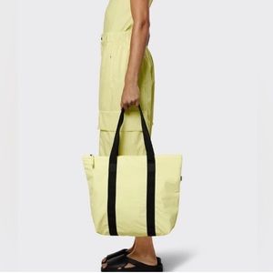 RAINS Waterproof Rush Tote Bag in Straw Yellow OS Black Straps Zip Pocket Lined