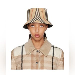 Burberry reversible icon stripe bucket hat.