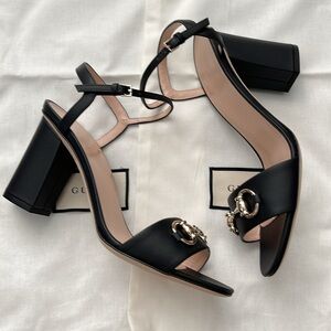 Gucci horsebit accent sandals.