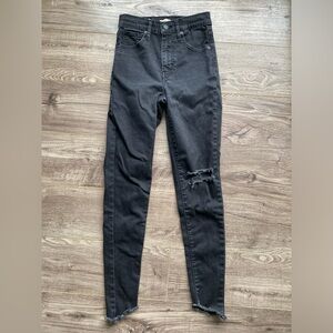 Levi’s mile high super skinny faded black distressed, slanted raw hem