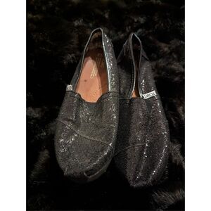 Toms, sparkly black slip on shoes. Size 2.5  youth. ￼