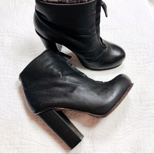 Dolce Vita dark brown 4” chunky heel zip front platform booties.