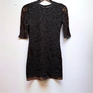 Diane Von Furstenburg Lace Dress with Silk Side Panels and trim in Black Size 2