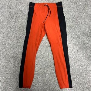 REI Co-op Outdoor Afro Leggings Womens Large Orange Black pockets stretch nylon