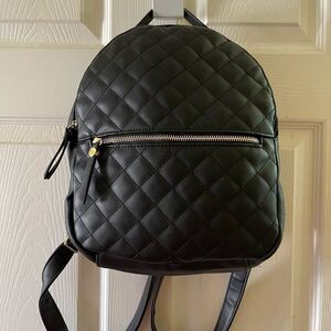 Liz Claiborne black quilted mini backpack with gold tone hardwares