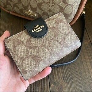 New coach Medium Corner Zip Wallet In Signature Canvas With Colorblock Interior