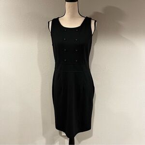 Sleeveless black dress with button details