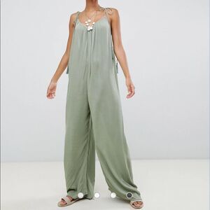 ASOS DESIGN Tall crinkle low back beach jumpsuit with tassel ties size 0