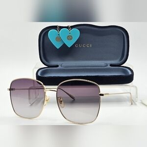 Gucci GG1030SK-003-60 Gold Sunglasses With earring accessories