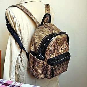 MCM PHYTON SNAKESKIN STUDDED BACKPACK