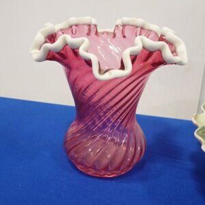 Vintage Fenton Cranberry swirl vase with white crested rim