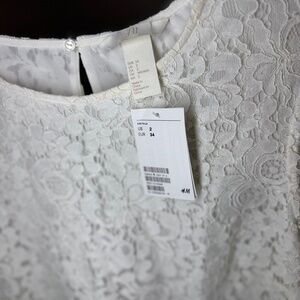 H&M White Lace Top with Bell Sleeves – Size 2