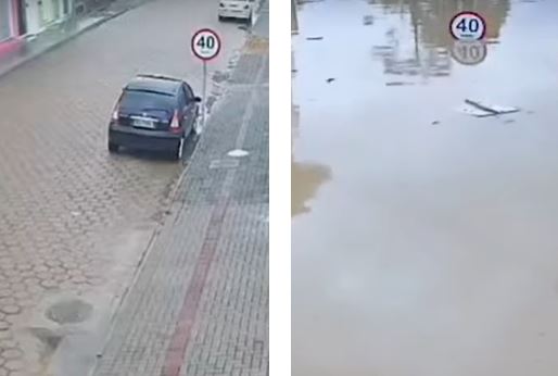Câmera de segurança mostra enchente cobrindo rua em Santa Catarina