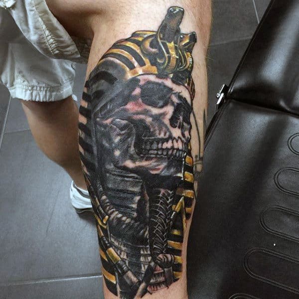 skull faced king tut mens leg tattoos