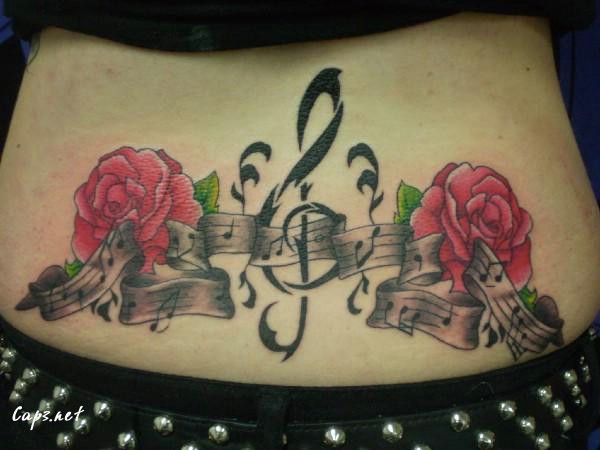 43 Flower and Note Low Back Tattoo