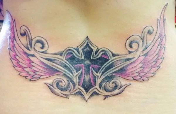 Lower Back Tattoo With Cross And Wings
