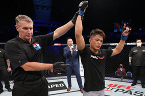 Toshiomi Kazama of Japan reacts after his victory over Maimaitituoheti Keremuaili of China in their bantamweight bout during the Road to UFC event at Singapore Indoor Stadium on June 09, 2022 in Singapore. (Photo by Jeff Bottari/Zuffa LLC)