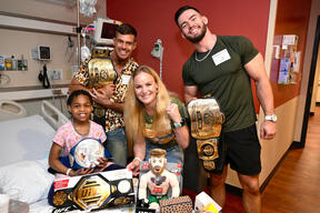 UFC and WWE stars visits Norton Children's Hospital in Louisville, Kentucky. 