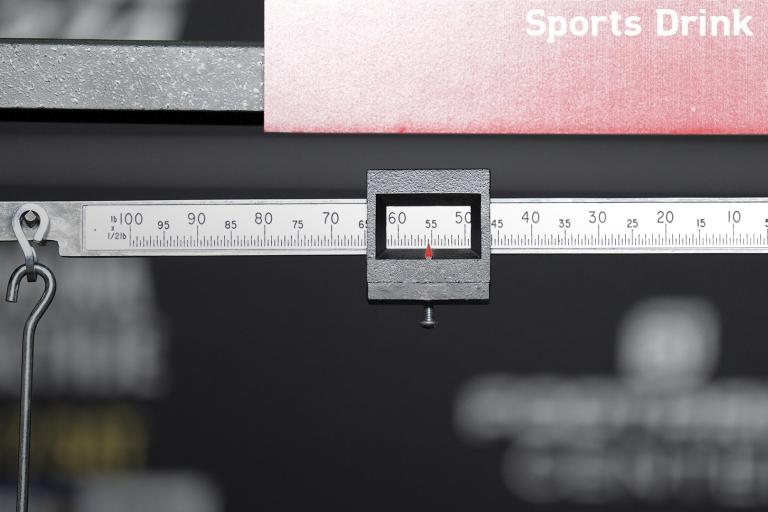 A detail view of the scale reading 155.5 pounds after Charles Oliveira of Brazil failed to make weight, vacating the UFC lightweight championship