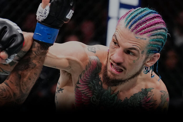 Sean O'Malley punches Marlon Vera of Ecuador in the UFC bantamweight championship fight during the UFC 299 event at Kaseya Center on March 09, 2024 in Miami, Florida. (Photo by Chris Unger/Zuffa LLC)