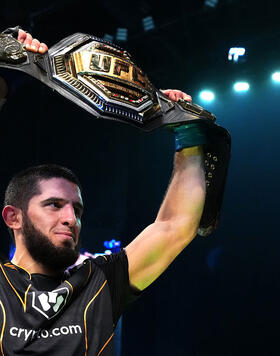 Islam Makhachev of Russia celebrates after his victory over Charles Oliveira of Brazil in their UFC lightweight championship fight during the UFC 280 event at Etihad Arena on October 22, 2022 in Abu Dhabi, United Arab Emirates. (Photo by Chris Unger/Zuffa LLC)