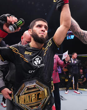 Islam Makhachev of Russia reacts after his knockout victory against Alexander Volkanovski of Australia in the UFC lightweight championship fight during the UFC 294 event at Etihad Arena on October 21, 2023 in Abu Dhabi, United Arab Emirates. (Photo by Chris Unger/Zuffa LLC)