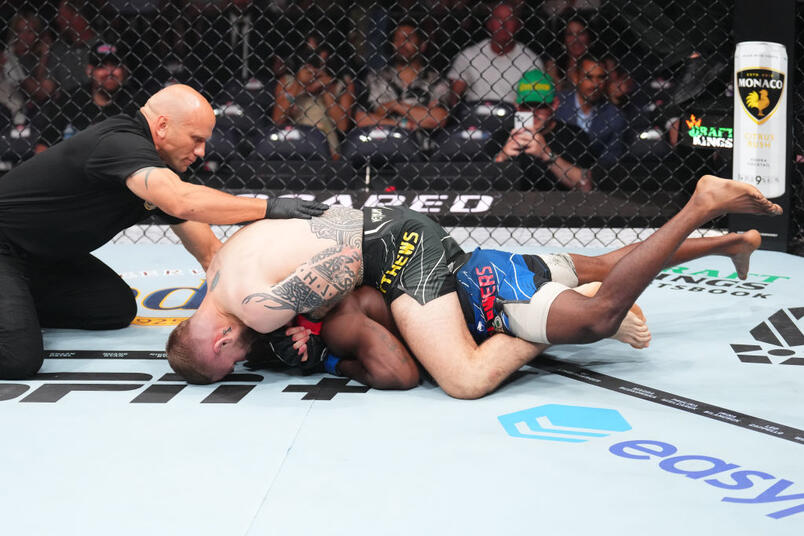 Jake Matthews of Australia (top) submits Darrius Flowers in a welterweight fight during the UFC 291 event at Delta Center on July 29, 2023 in Salt Lake City, Utah. (Photo by Josh Hedges/Zuffa LLC)