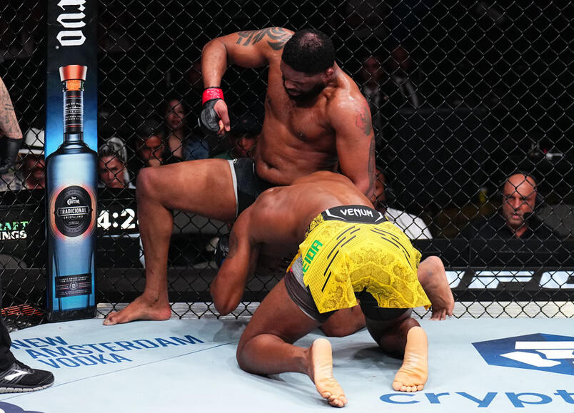 Curtis Blaydes punches Jailton Almeida of Brazil in a heavyweight fight during the UFC 299 event at Kaseya Center on March 09, 2024 in Miami, Florida. (Photo by Chris Unger/Zuffa LLC)