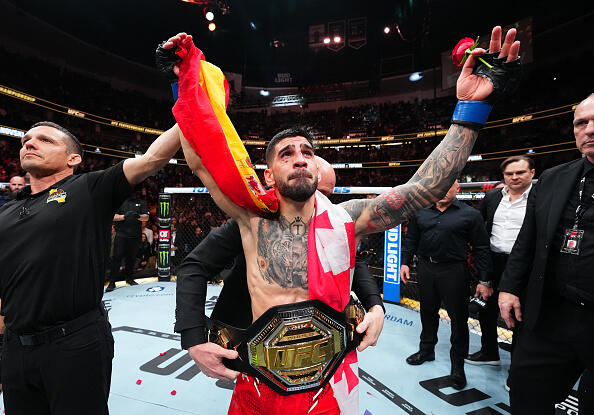 Ilia Topuria celebrates after his knockout victory against Alexander Volkanovski of Australia in the UFC featherweight championship fight during the UFC 298 event at Honda Center on February 17, 2024 in Anaheim, California. (Photo by Chris Unger/Zuffa LLC)