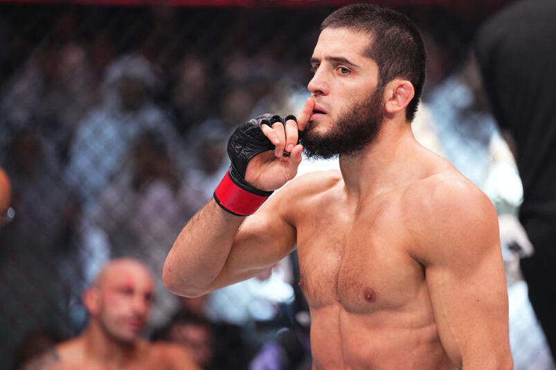 Islam Makhachev of Russia reacts after his knockout victory against Alexander Volkanovski of Australia in the UFC lightweight championship fight during the UFC 294 event at Etihad Arena on October 21, 2023 in Abu Dhabi, United Arab Emirates. (Photo by Chris Unger/Zuffa LLC)