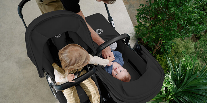 child in bugaboo donkey stroller